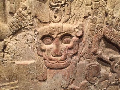 Close up detail of Stela 5's carving, showing what appears to be the head of a panther.