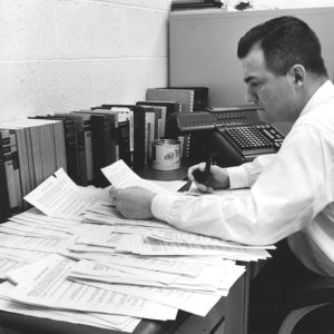 A business education student from Wisconsin studies at a desk