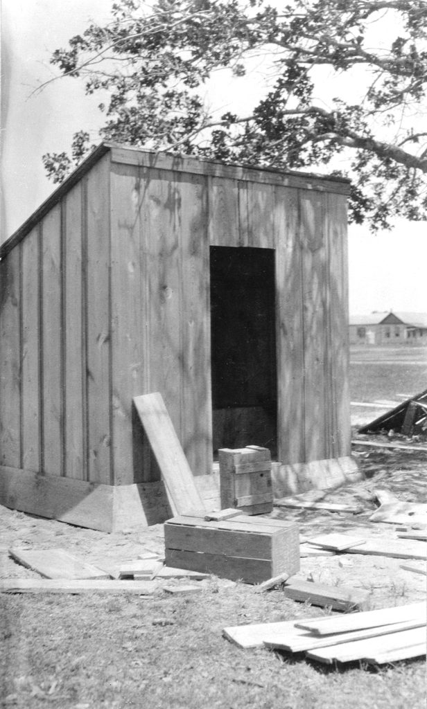 Photograph of a sanitary privy meeting public health standards that is under construction.