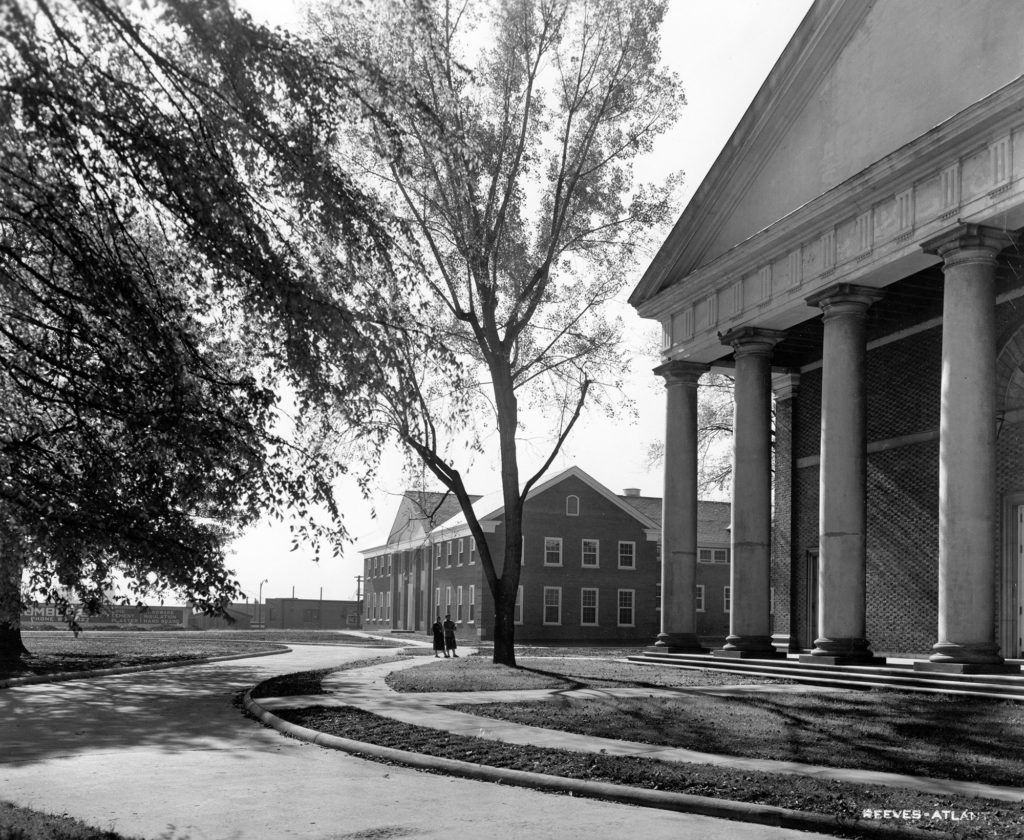 View of two buildings with columns in front of a green, at Spelman College, a historically black college.