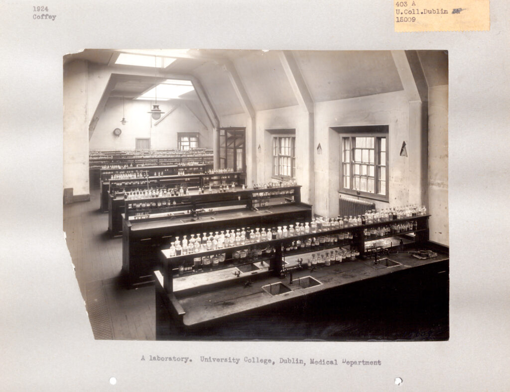 Five rows of laboratory tables at Medical Laboratory at University College, Dublin filled with medical laboratory equipment.